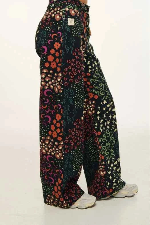 Colorful patterned pants on a white background