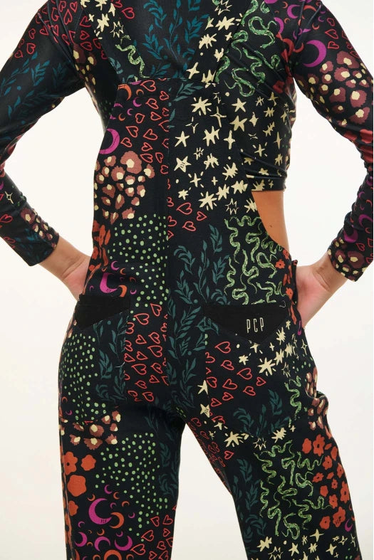 Colorful patterned outfit with long-sleeve top and pants on a white background