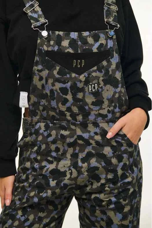 Camouflage overalls with 'PCP' branding worn by a person on a white background