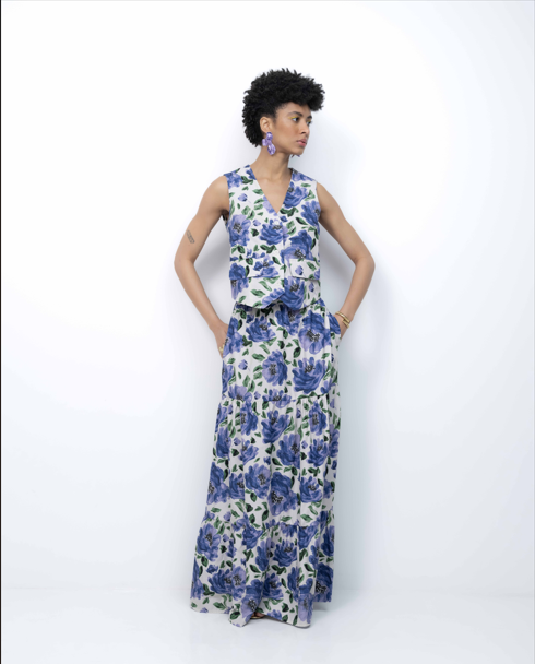 Woman wearing a floral dress on a white background