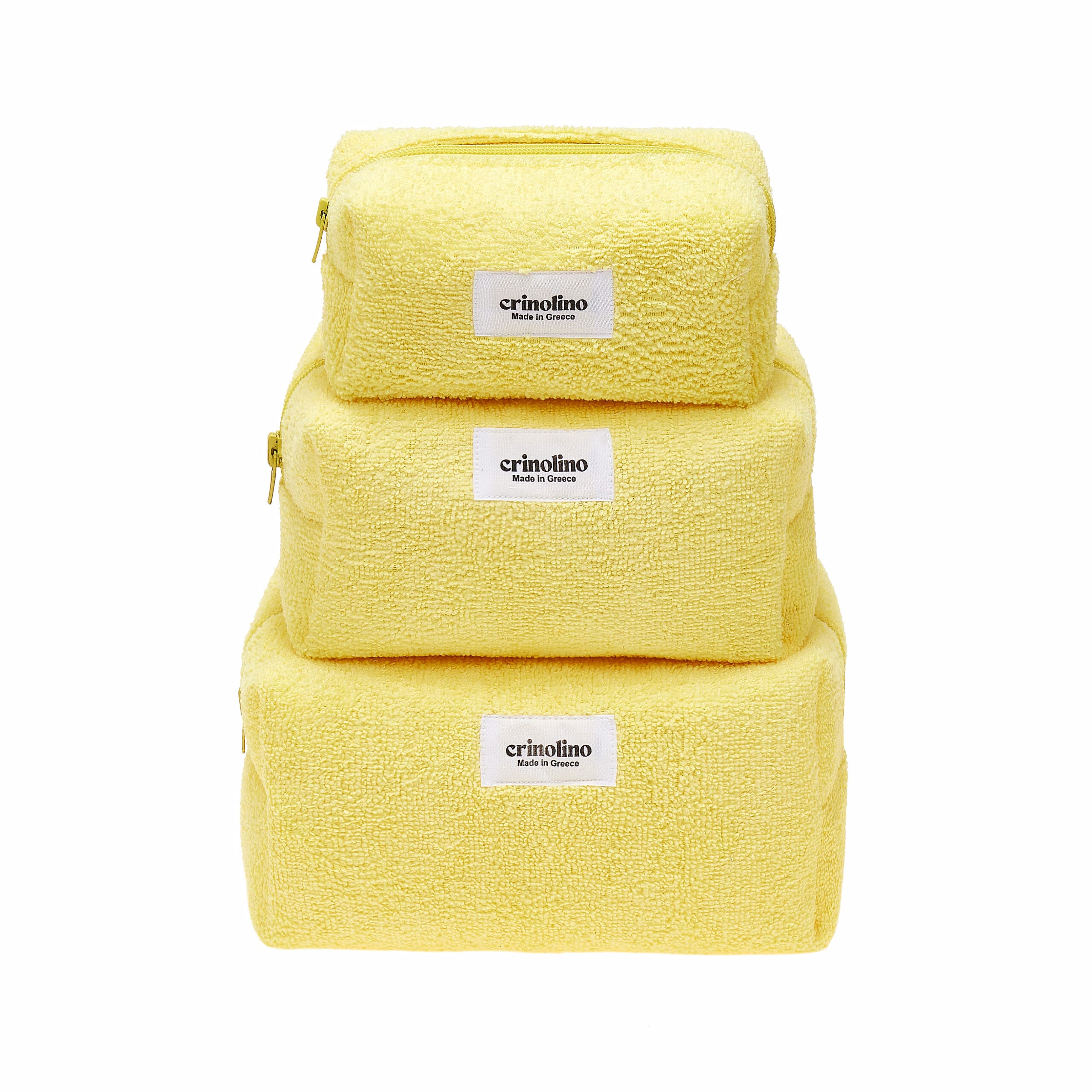Three yellow textured bags stacked on a white background with 'crinolino' label.