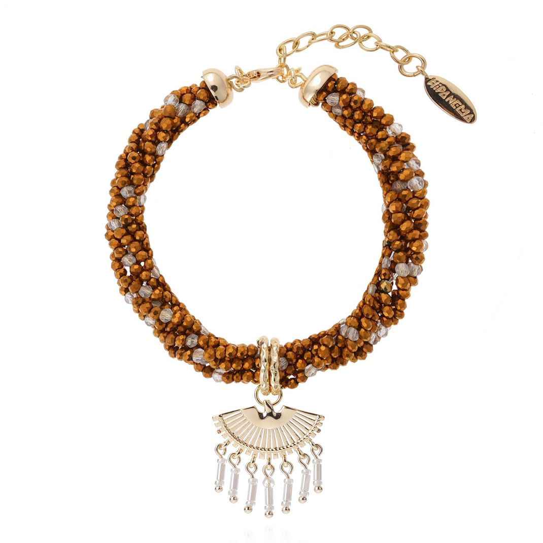 Beaded bracelet with gold accents and a fan-shaped charm on a white background