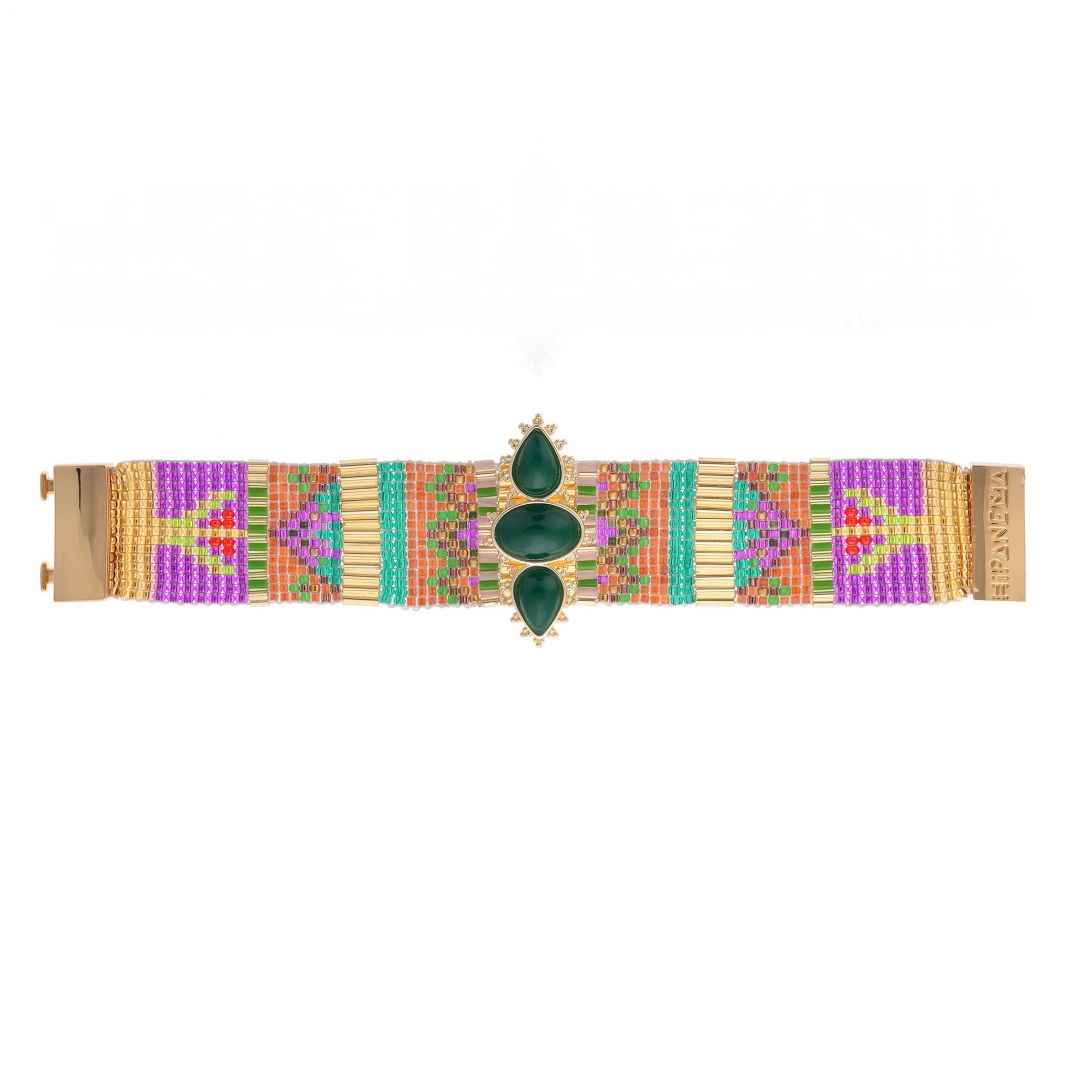 Colorful woven bracelet with a gold clasp on a white background