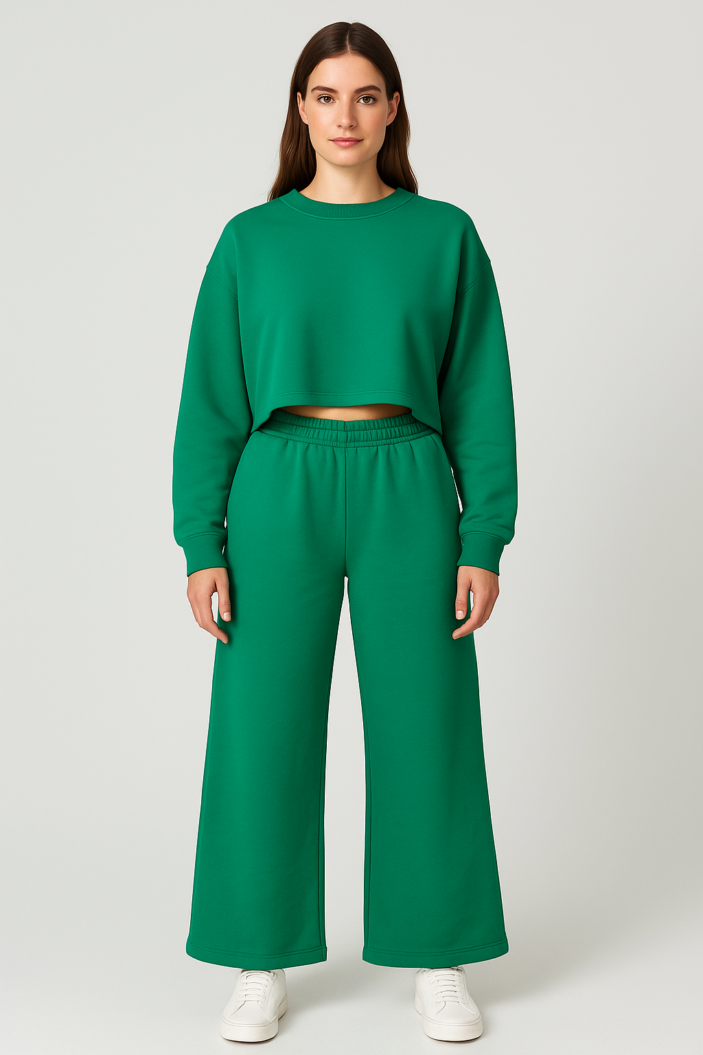 Woman wearing a green outfit on a white background