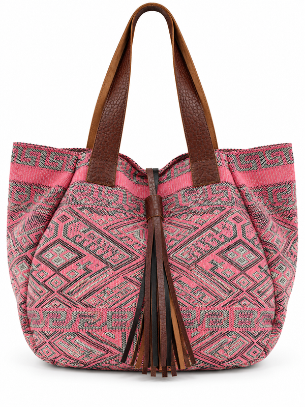 A pink and brown patterned tote bag with textured brown faux-leather handles and a matching tassel detail, shown against a plain white background.
