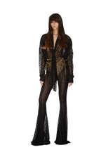 Odi Odi Oria black sheer floral lace bodysuit with long neck ties, styled with flared trousers and a chain belt