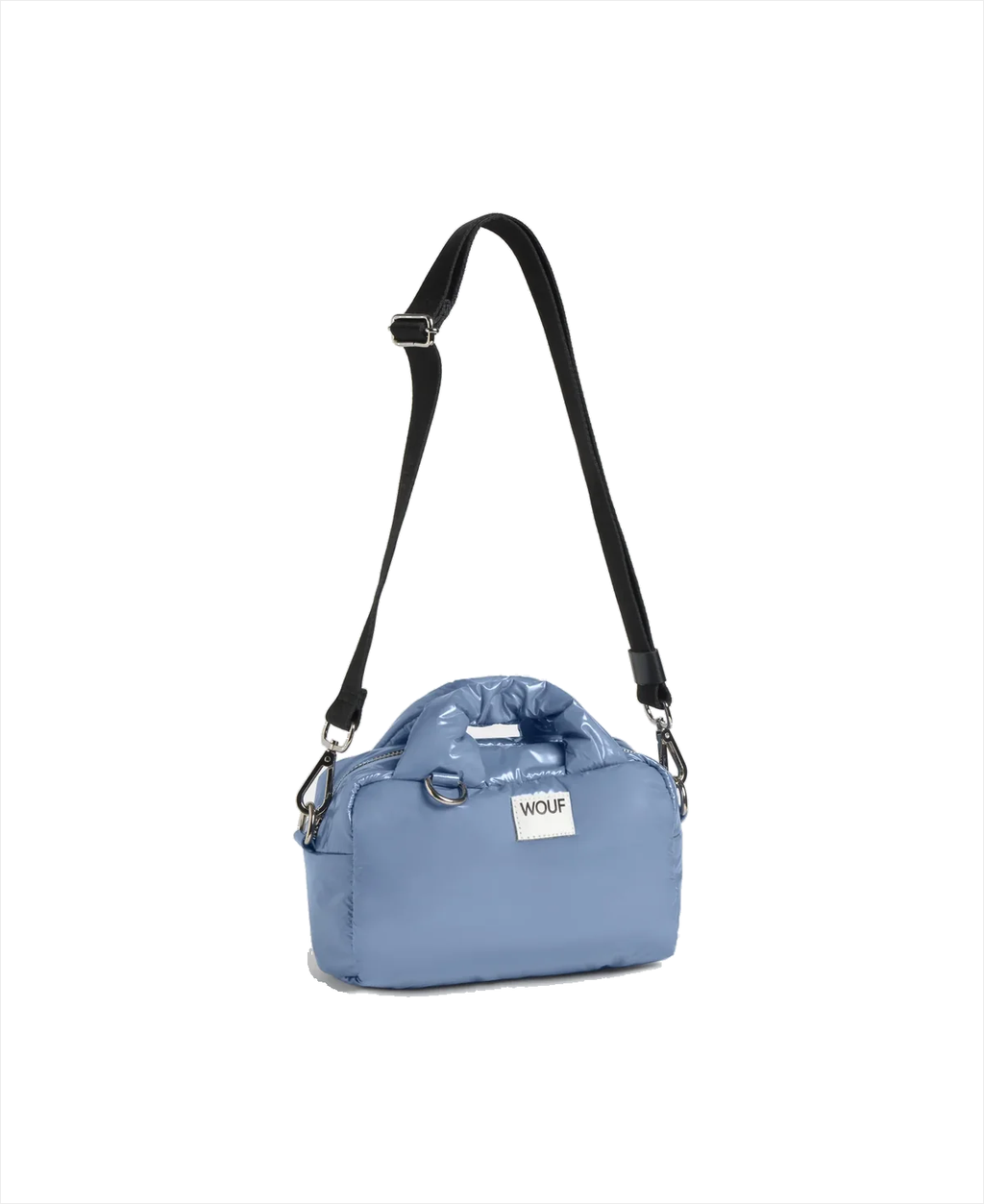 A light blue puffy crossbody bag with a black shoulder strap and a white brand label that reads 'WOLF'.