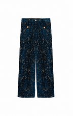 A pair of dark navy wide-leg pants featuring an all-over gold speckled pattern, shown flat against a solid white background.