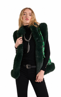A model wearing a dark forest green faux fur vest with a sequined green lining, styled over a black turtleneck and black pants against a solid white background.