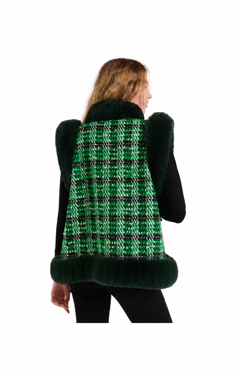 A woman shown from the back wearing a sleeveless green plaid vest with dark green faux-fur trim, over a black top and black pants, against a plain white background.
