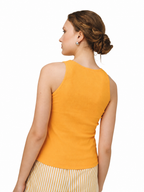 A woman shown from the back wearing a bright yellow sleeveless top and a yellow-and-white striped skirt, against a plain white background.