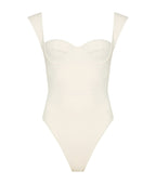 White swimsuit with thin straps on a white background