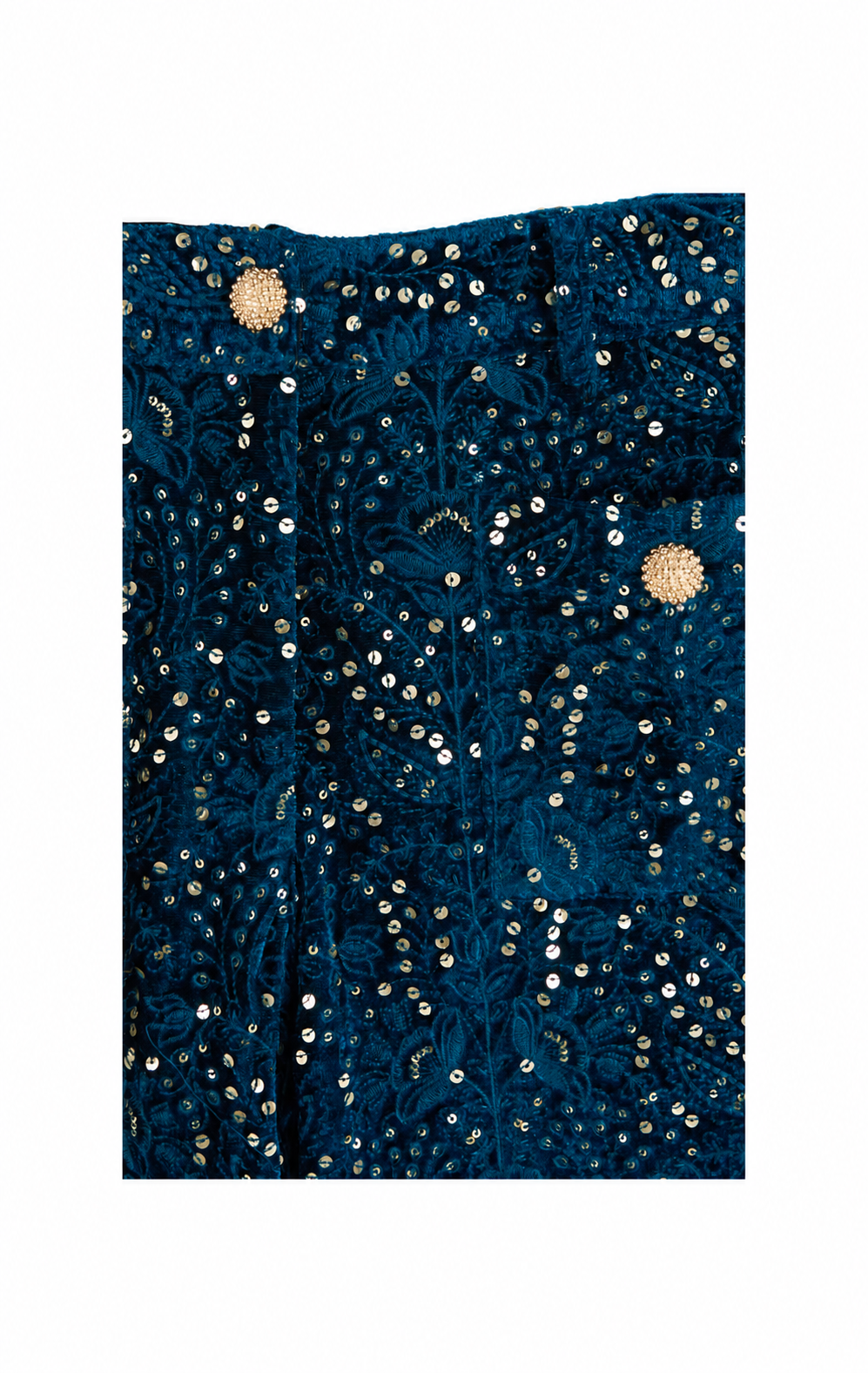 A close-up of a dark teal blue velvet fabric adorned with intricate gold sequins and beadwork, featuring two prominent round gold embellishments near the top.