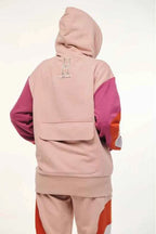 Colorful tracksuit with pink and orange design on a white background