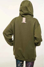 Green hoodie with a visible brand label on the back against a white background