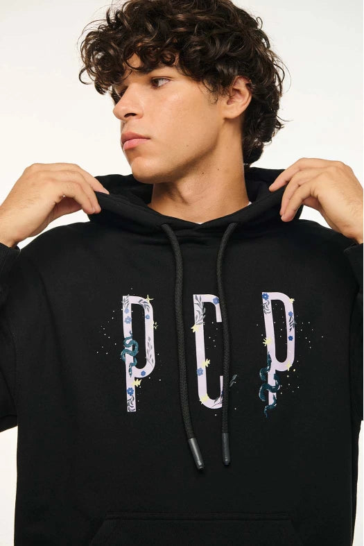 Person wearing a black hoodie with 'PEP' design on a plain background
