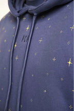 Navy blue hoodie with star pattern and 'Vera' branding.