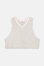Light-colored sleeveless top with a V-neck on a white background