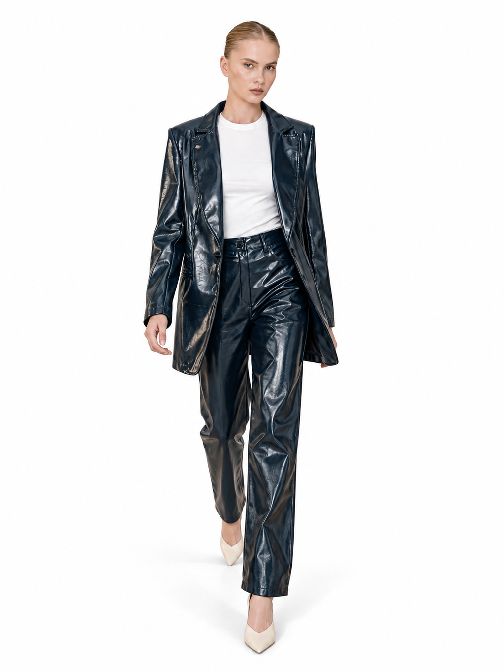 Love And Alicia Sailor navy vinyl trousers, walking front view showing the glossy straight-leg cut