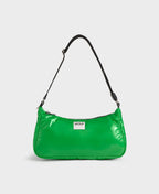 Green handbag with a visible brand logo on a white background
