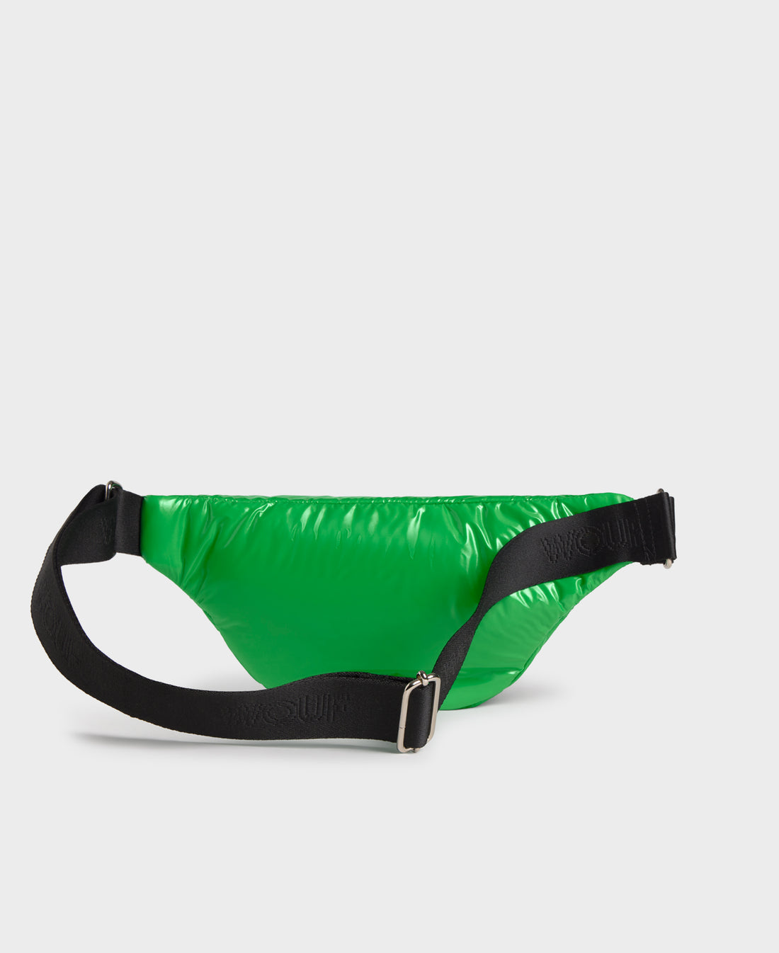 Green waist bag with black strap on a light gray background