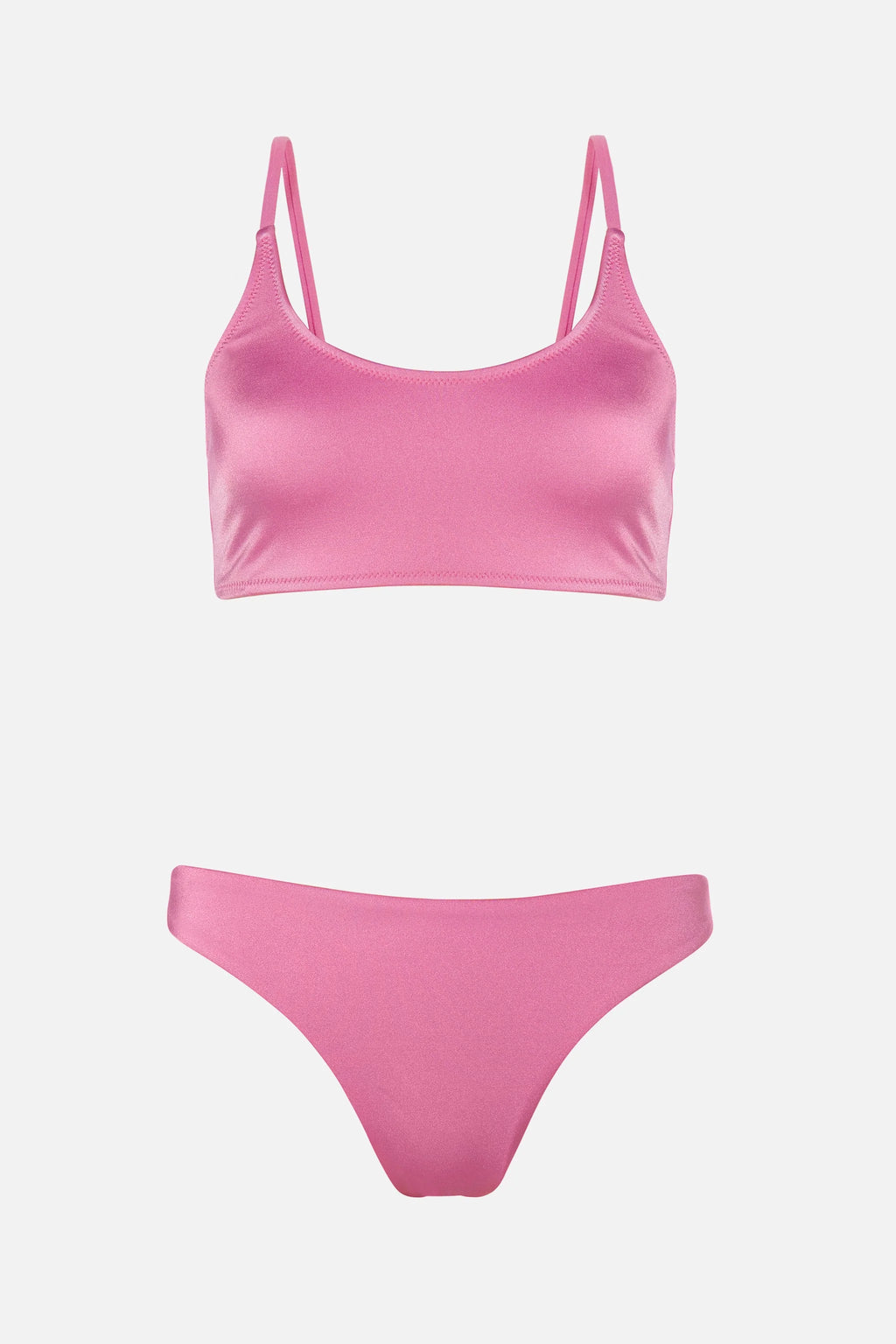 Pink bikini set on a light gray background