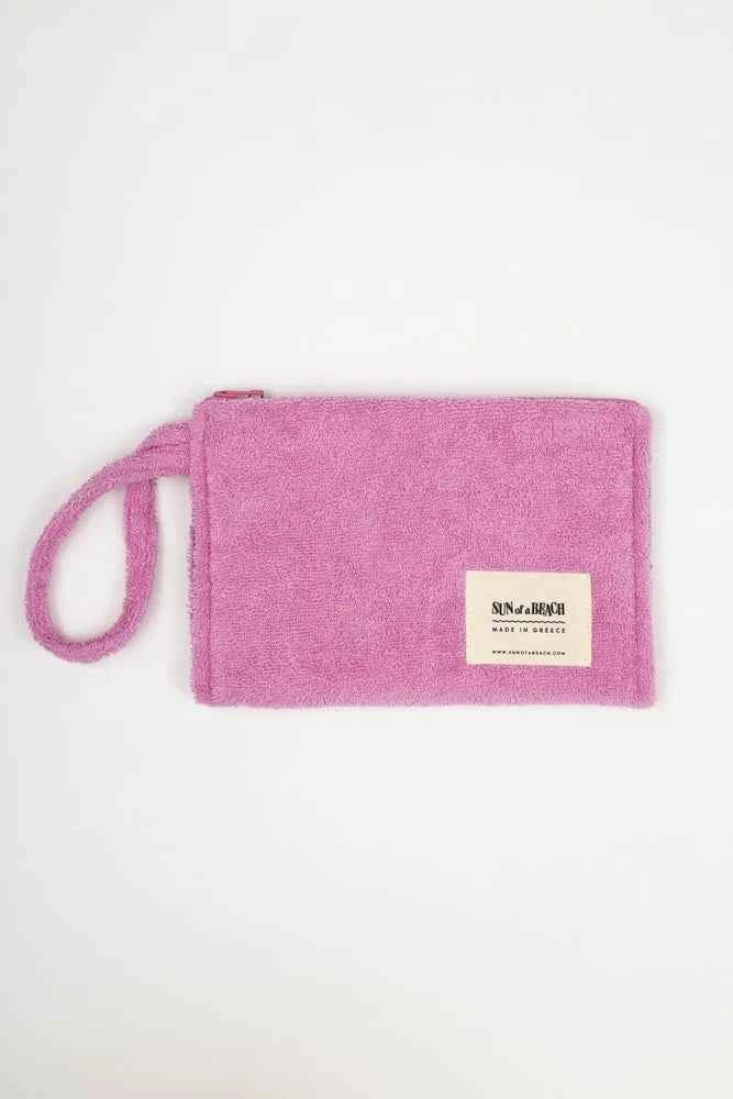 Pink pouch with a brand label on a white background