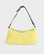 Yellow handbag with a black strap on a light gray background