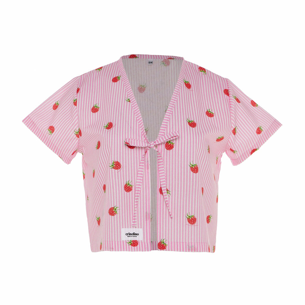 Pink jacket with strawberry pattern on a white background