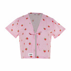 Pink jacket with strawberry pattern on a white background