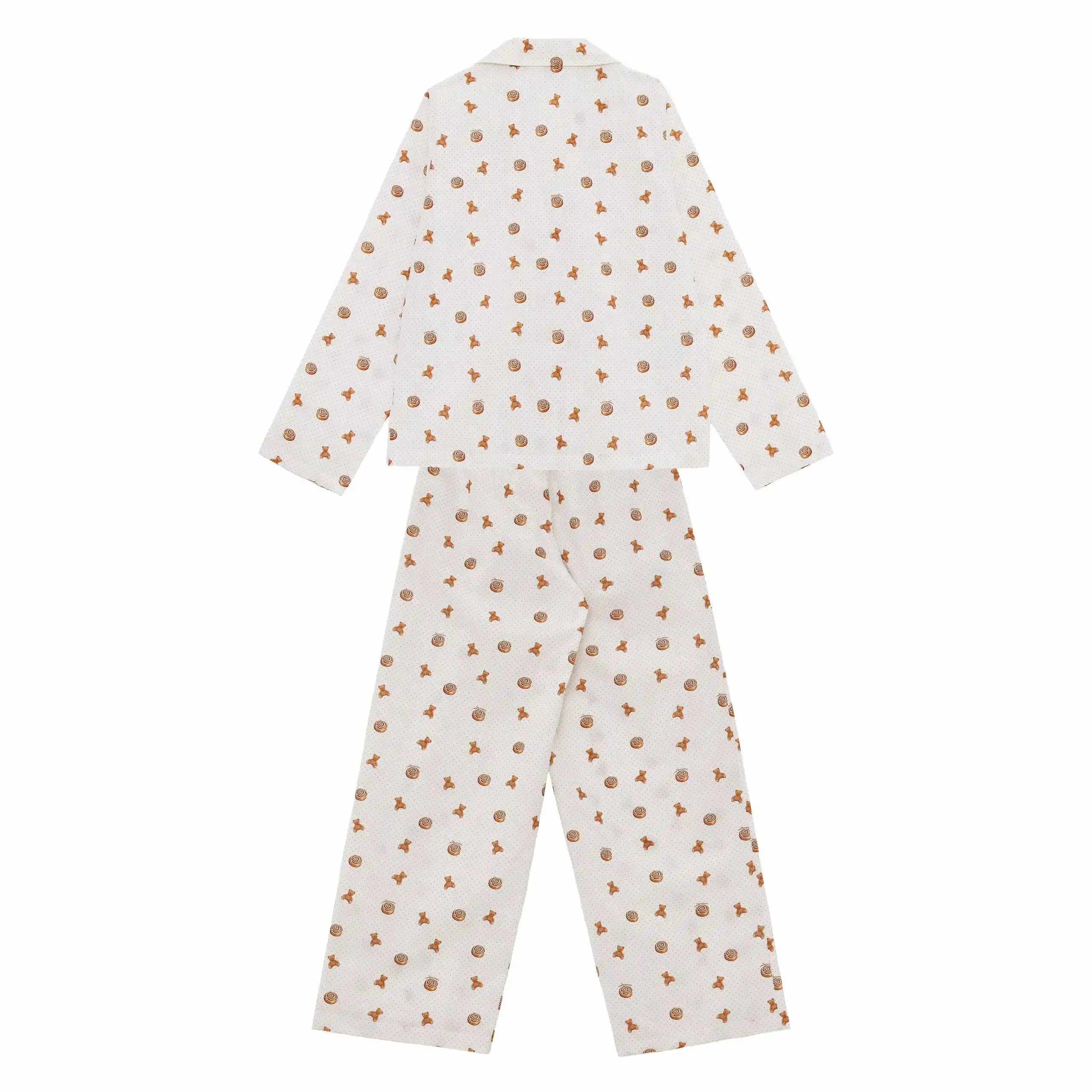 White pajama set with small brown patterns on a white background
