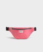 Pink waist bag with a visible brand logo 'Wouf' on a light gray background