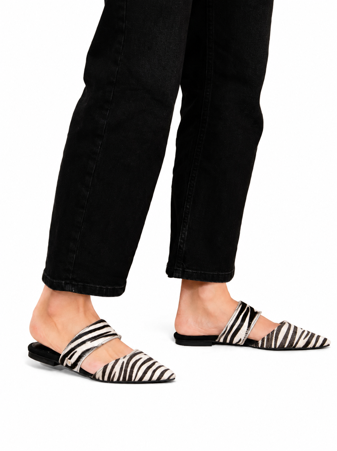Sandalista Bianconero black and white zebra print leather mules with pointed toe and ankle strap worn with straight black jeans