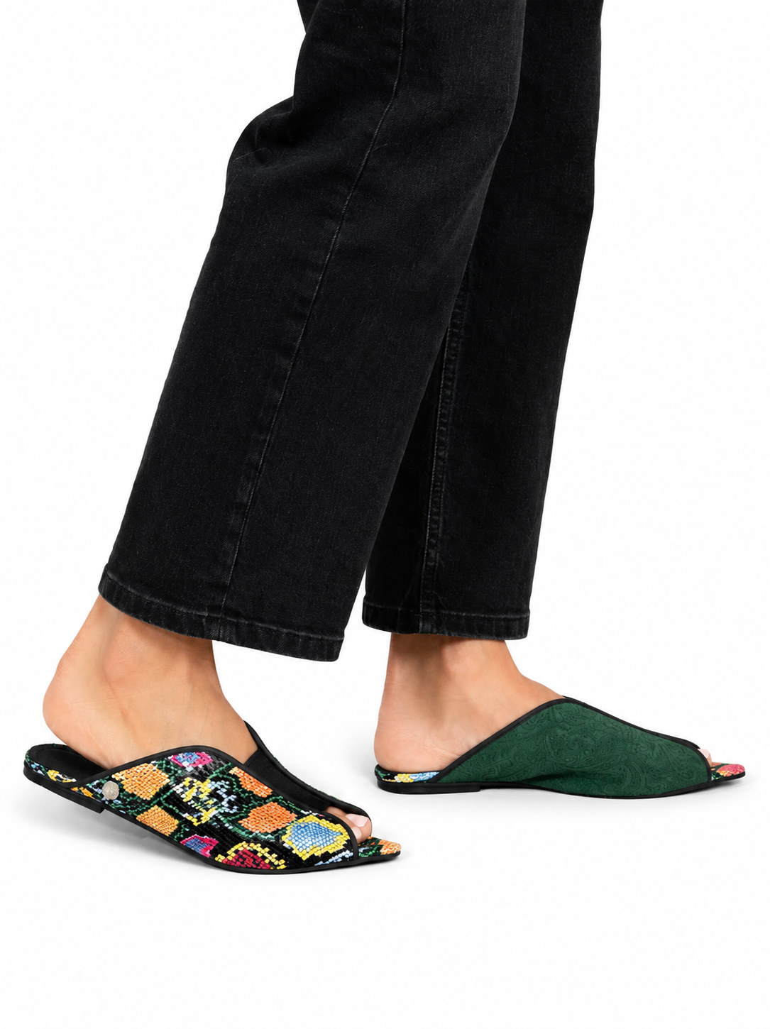 Sandalista Cap Multi flat leather mules with multicolour snake print and green suede cap toe worn with straight black jeans side view