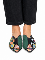 Sandalista Cap Multi flat leather mules with multicolour snake print and green suede cap toe worn with wide-leg black jeans overhead view