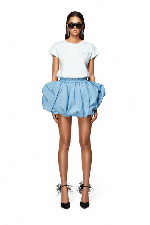 Sampacho balloon mini skirt in powder blue with voluminous gathered silhouette, front view on model.