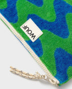 Dog toy with a camouflage pattern and a visible brand logo on a white background