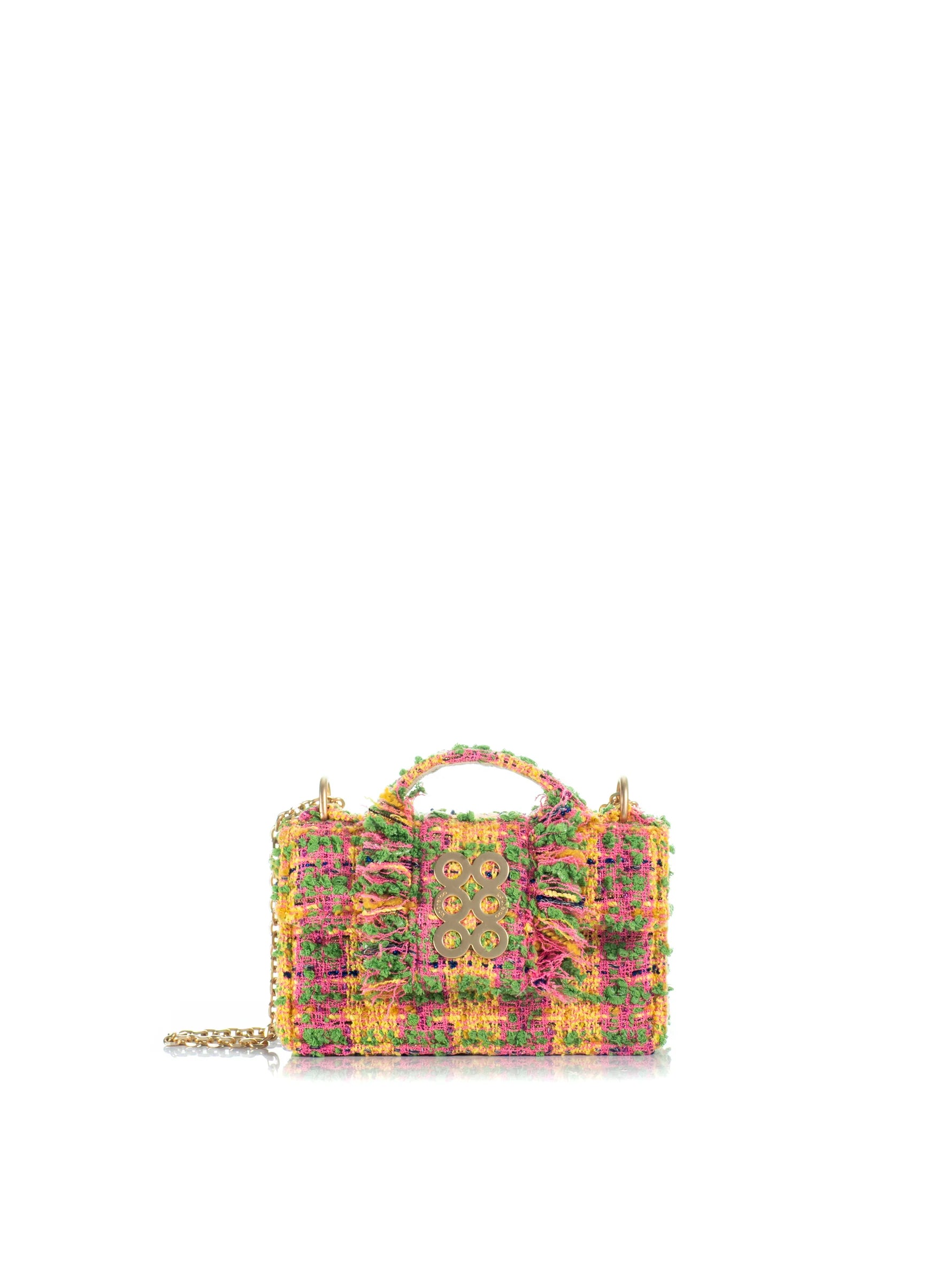 Colorful handbag with intricate patterns on a white background