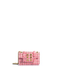 Pink tweed handbag with gold accents on a white background
