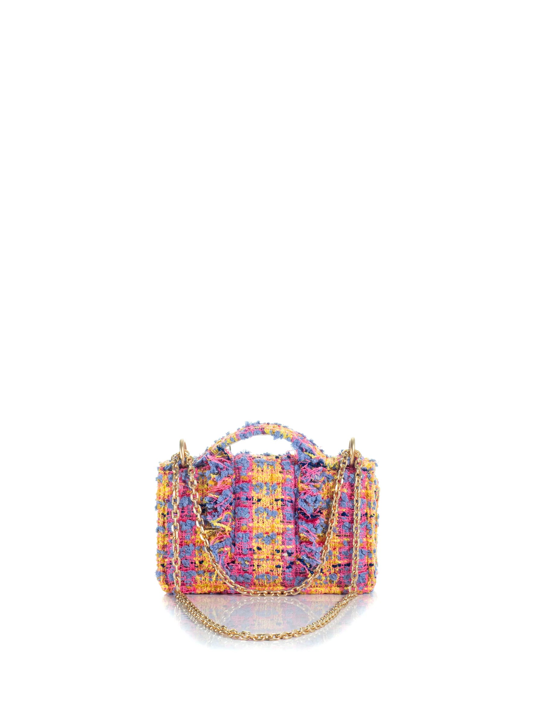 Multicolored handbag with a chain detail on a white background