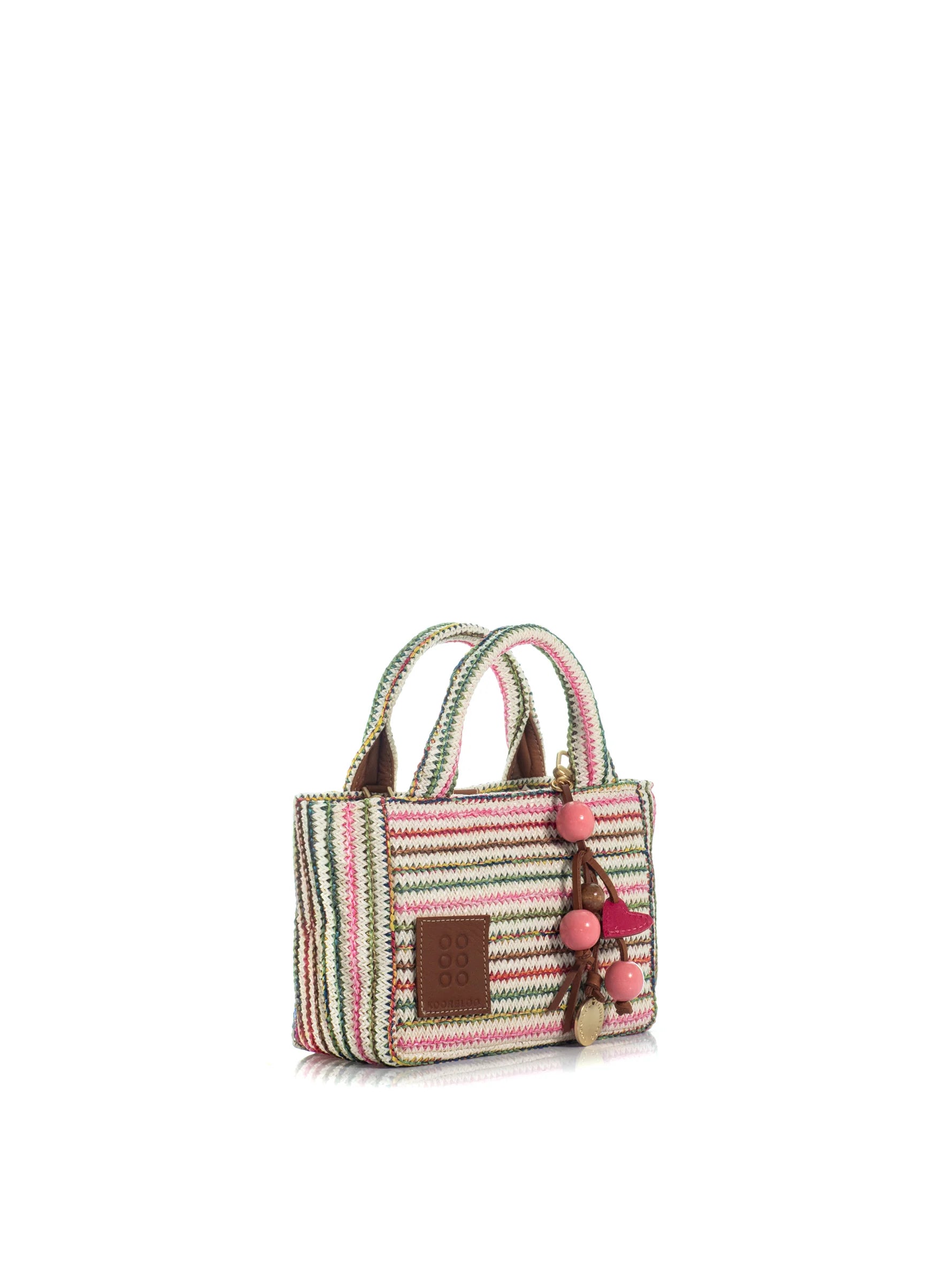 Striped handbag with pom-pom details on a white background
