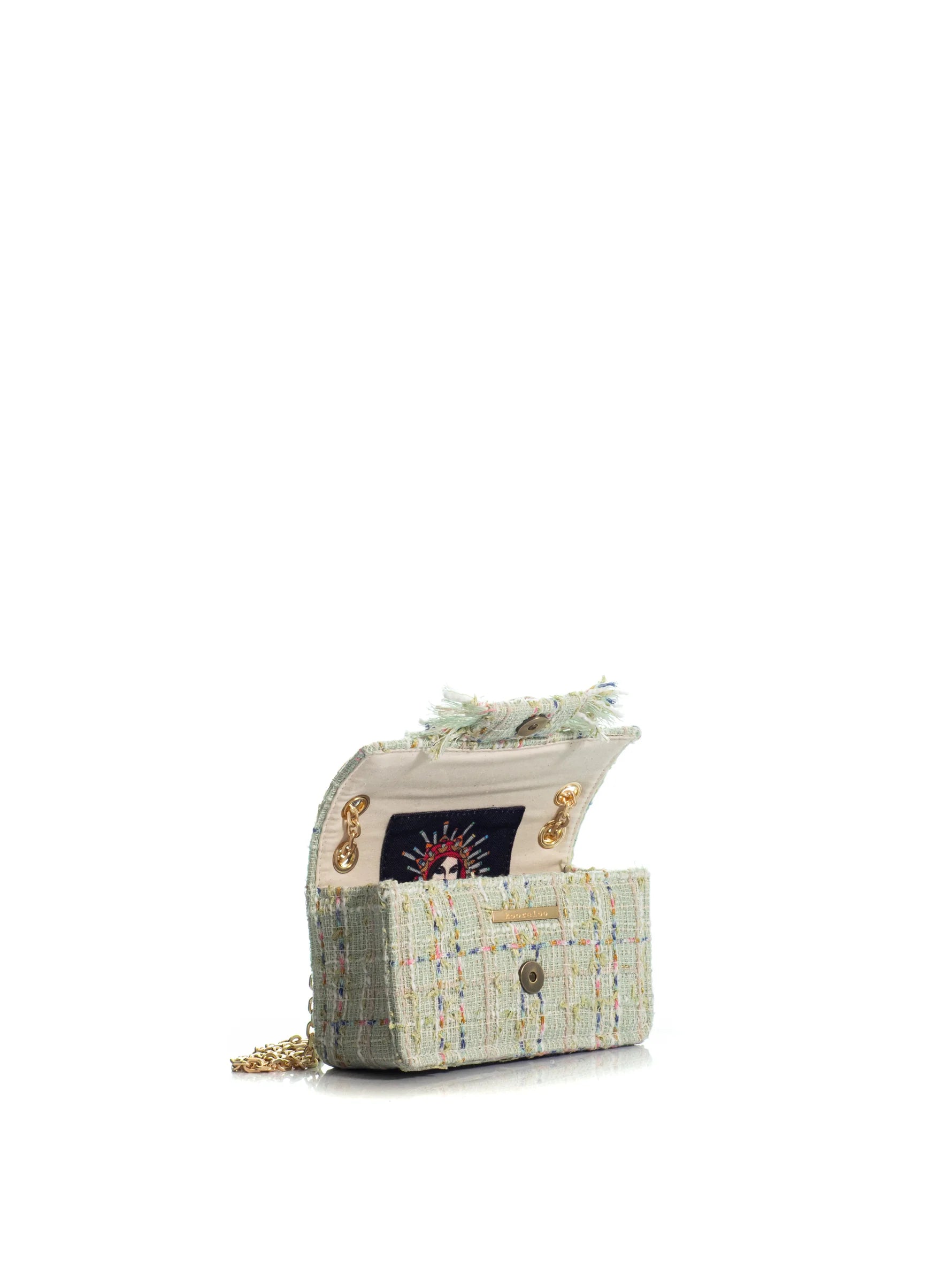 Designer handbag with a textured pattern on a white background