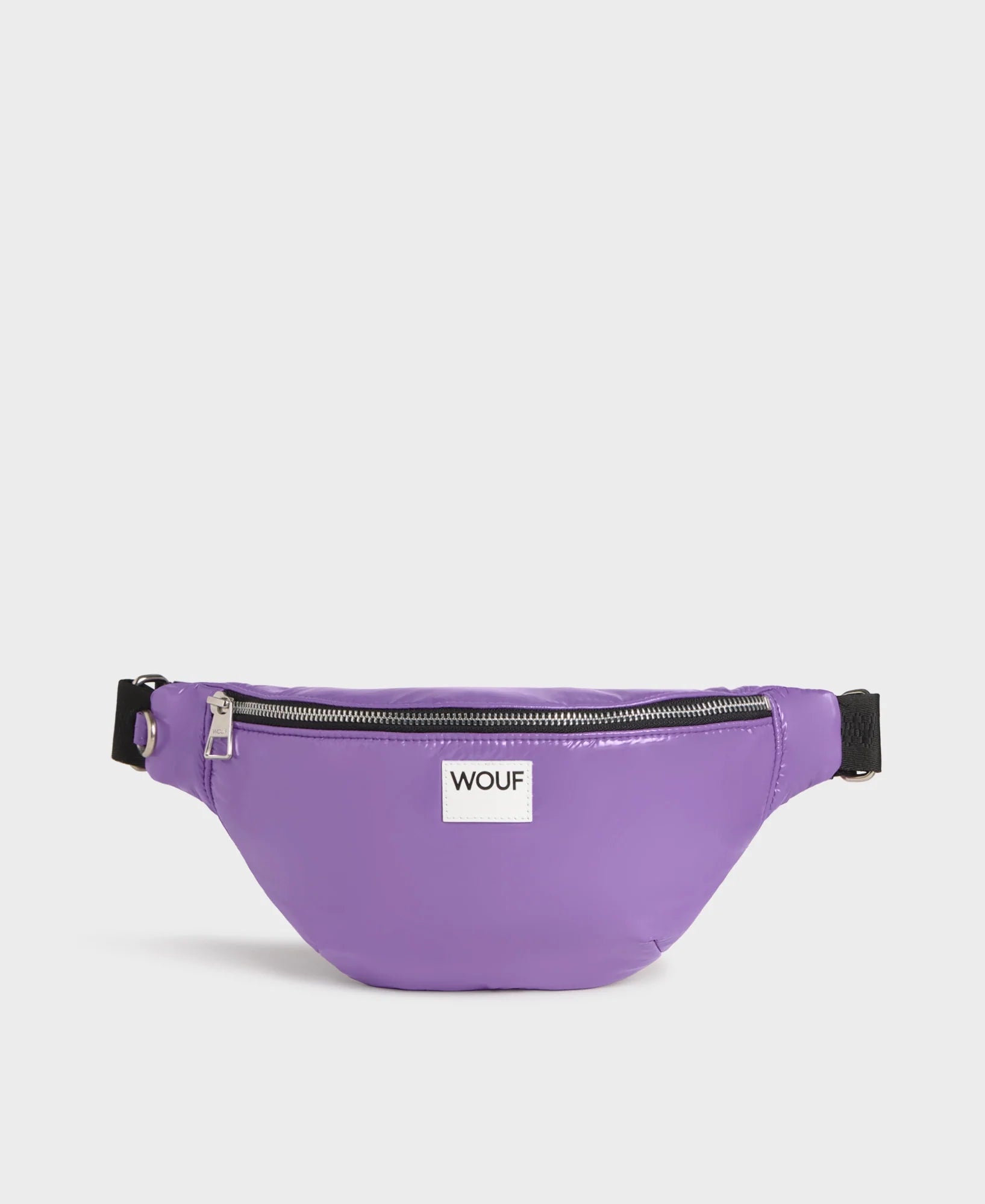 Purple waist bag with a visible brand logo on a white background