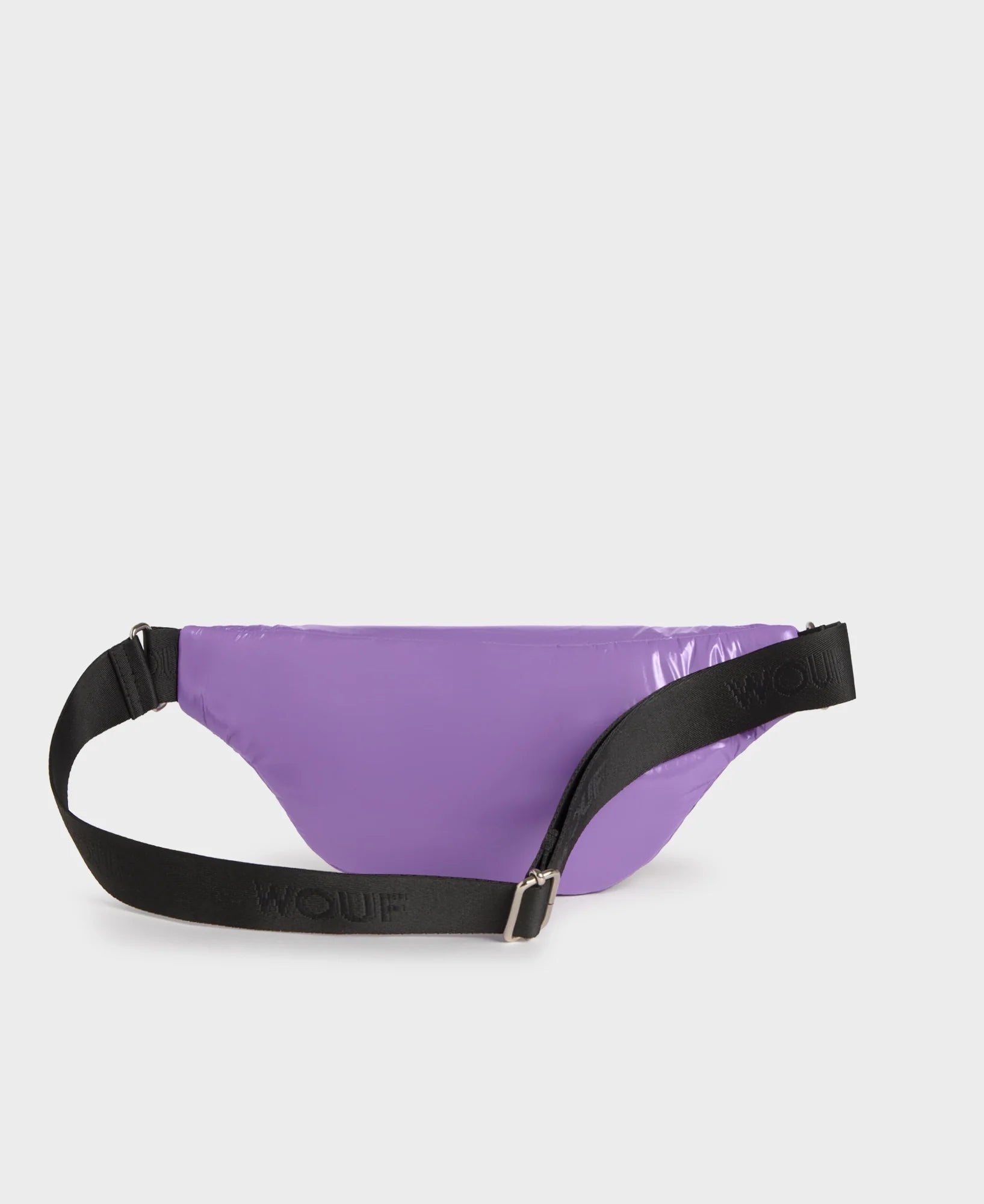 Purple waist bag with black strap on a light gray background