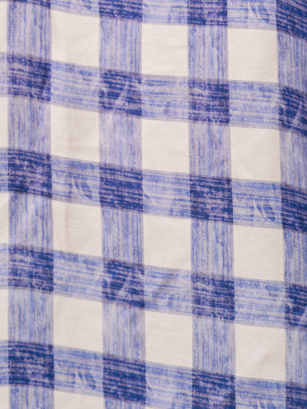 Blue and white checkered fabric pattern
