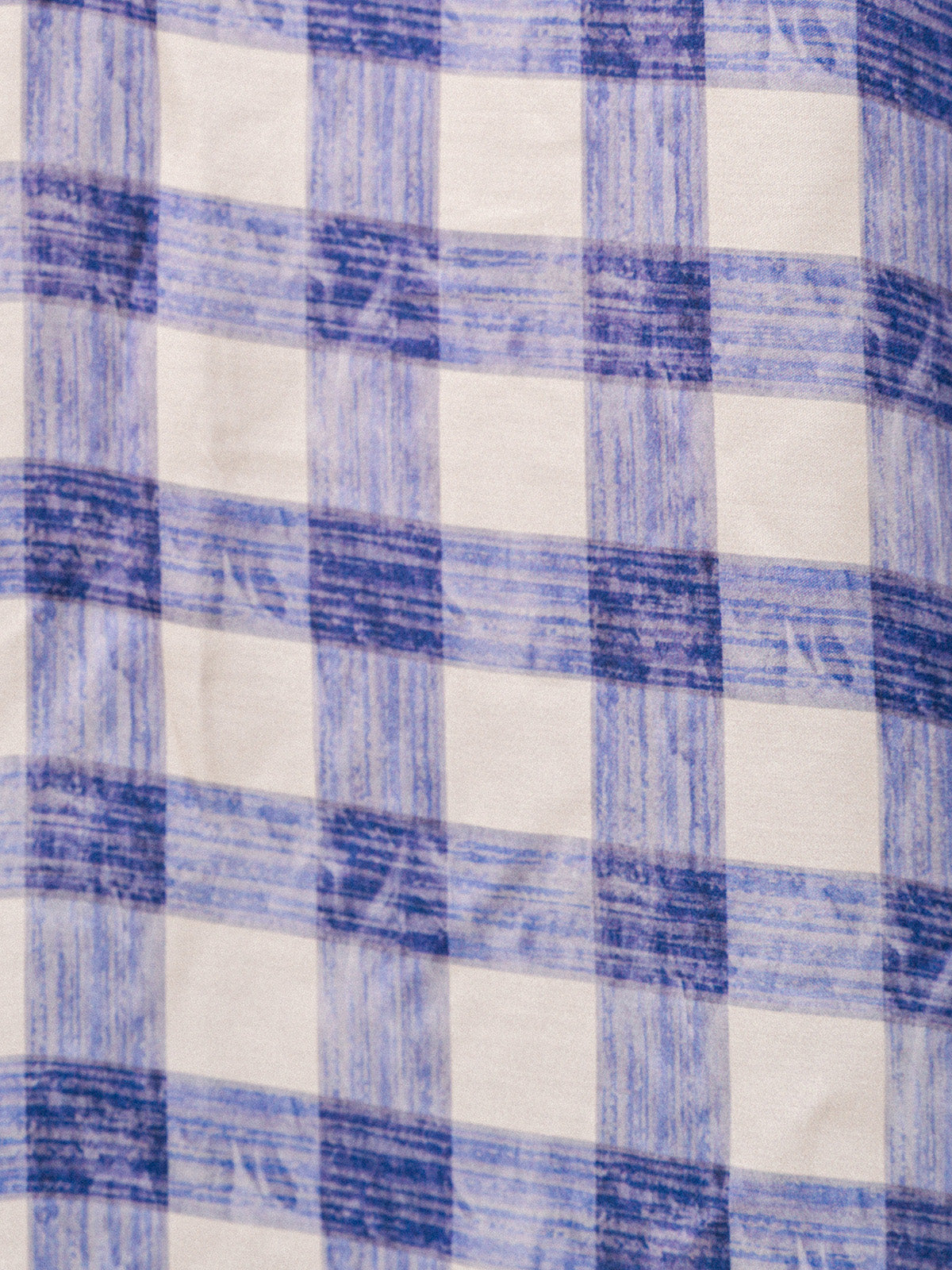 Blue and white checkered fabric pattern