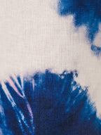 Close-up of tie-dye fabric with blue and white patterns