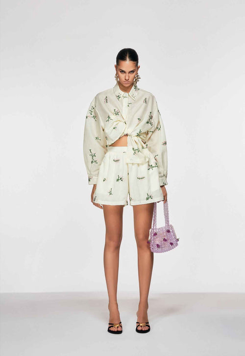 Oui Odile Martina cream linen shirt and shorts co-ord set with delicate green botanical embroidery