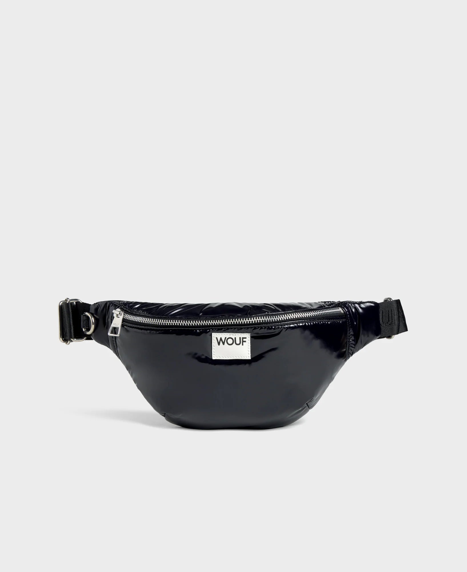 Black waist bag with 'WOUF' brand logo on a light gray background