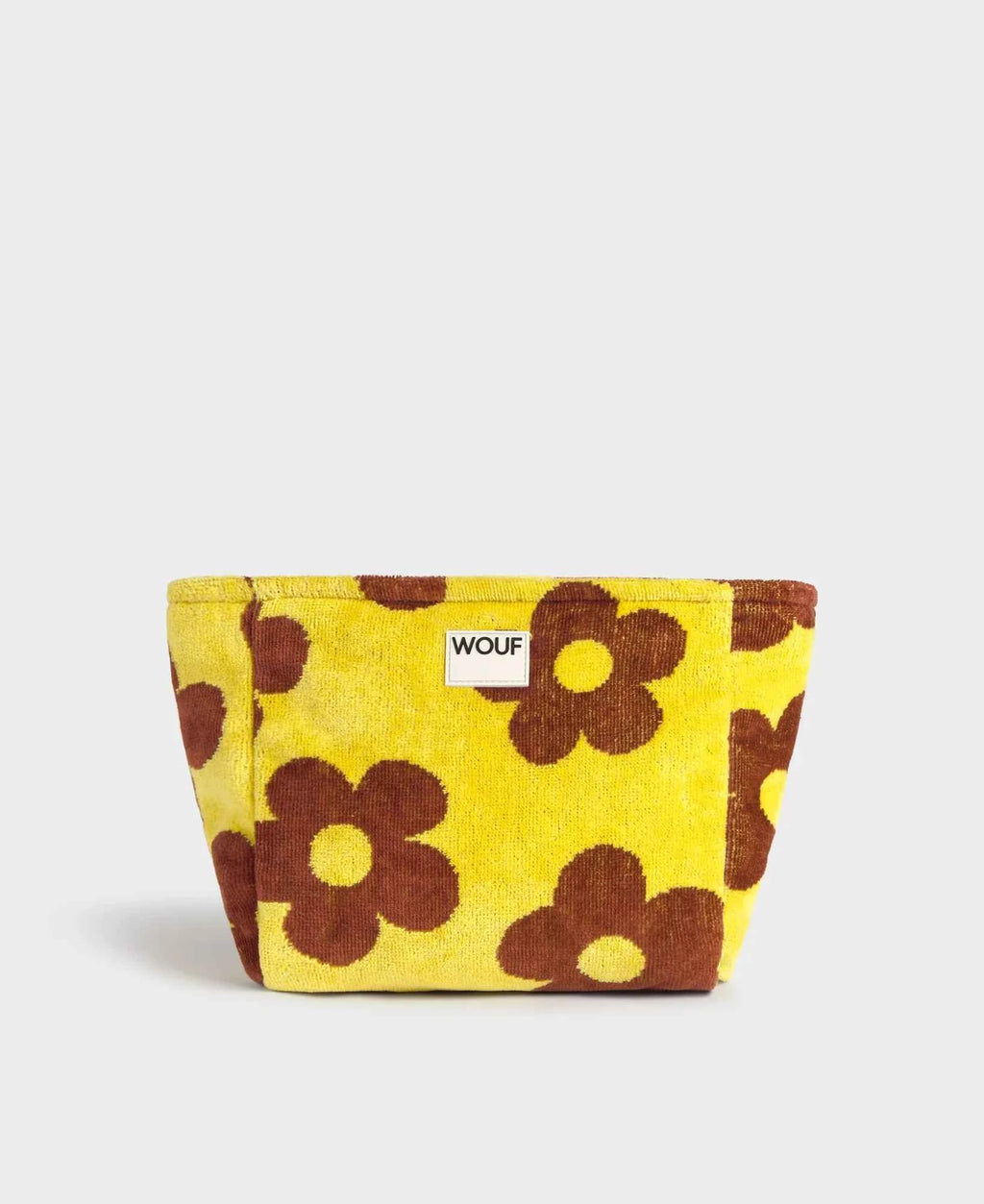 Yellow fabric pouch with brown floral patterns on a white background